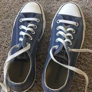Blue Converse tennis shoes